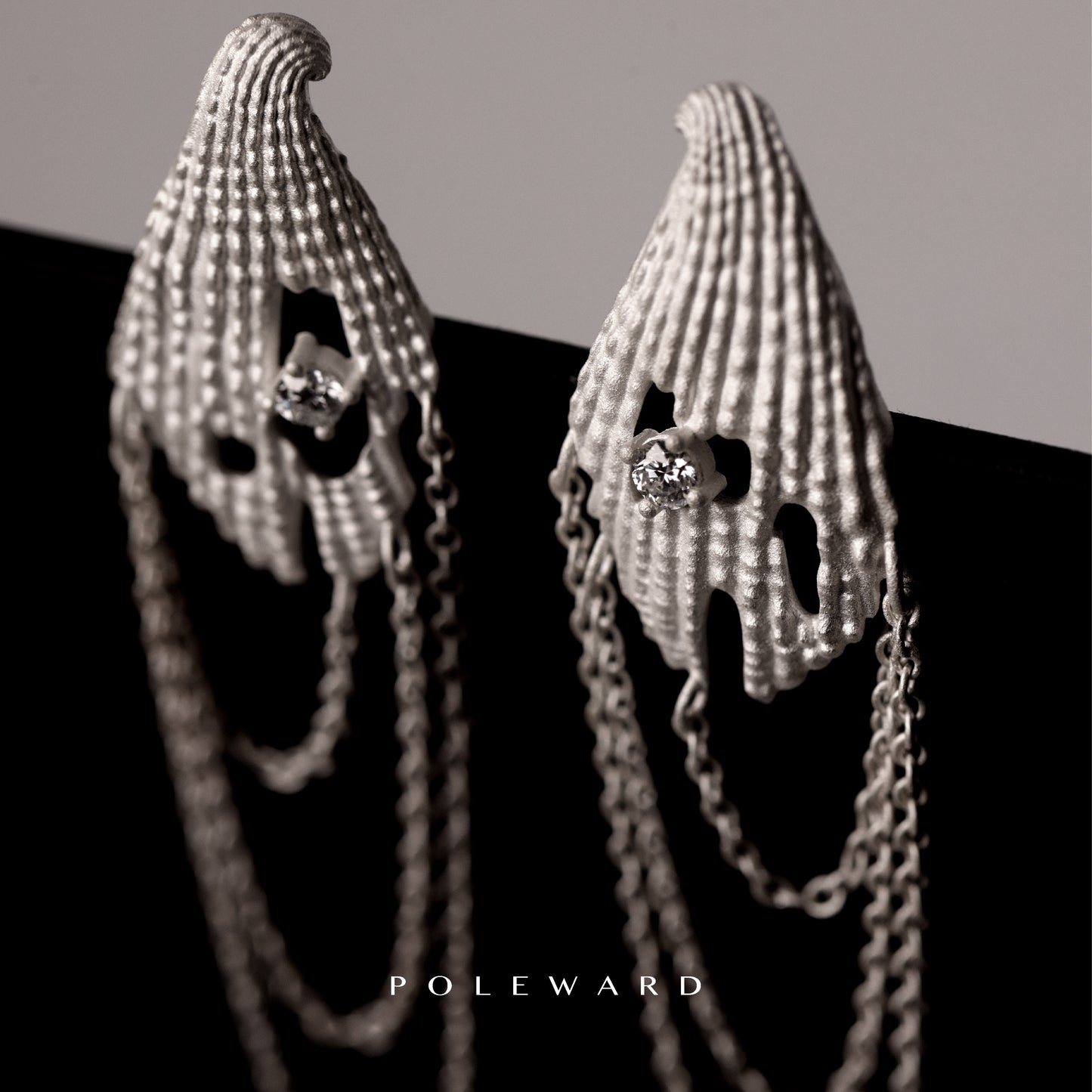 YamSuph series silver shell tassel earrings